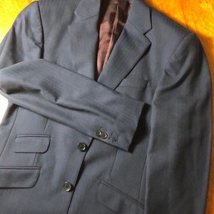 Handsome, slim fit navy blue blazer